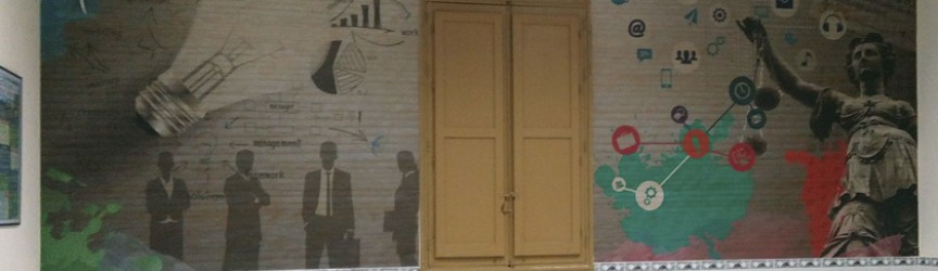 Montaje vinilo temático en aula.