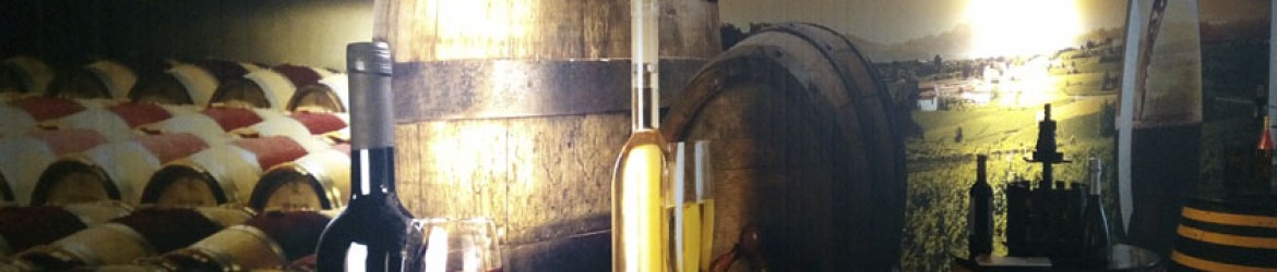 Montaje y rotulación de vinilos diseñados para bodega de vinos.